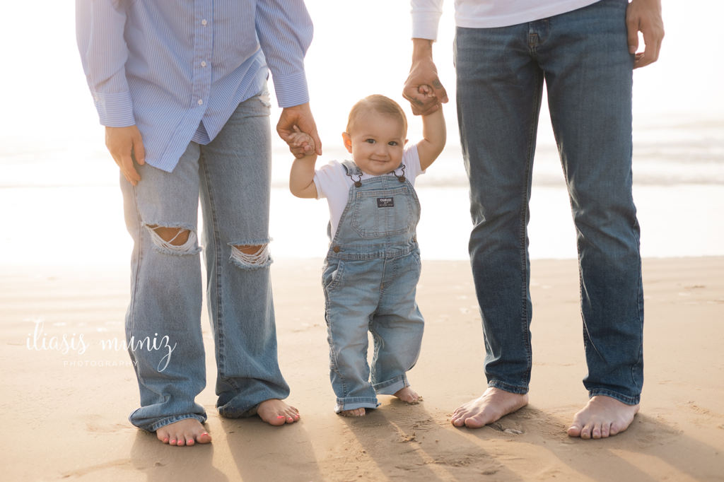 beach poses for family of three