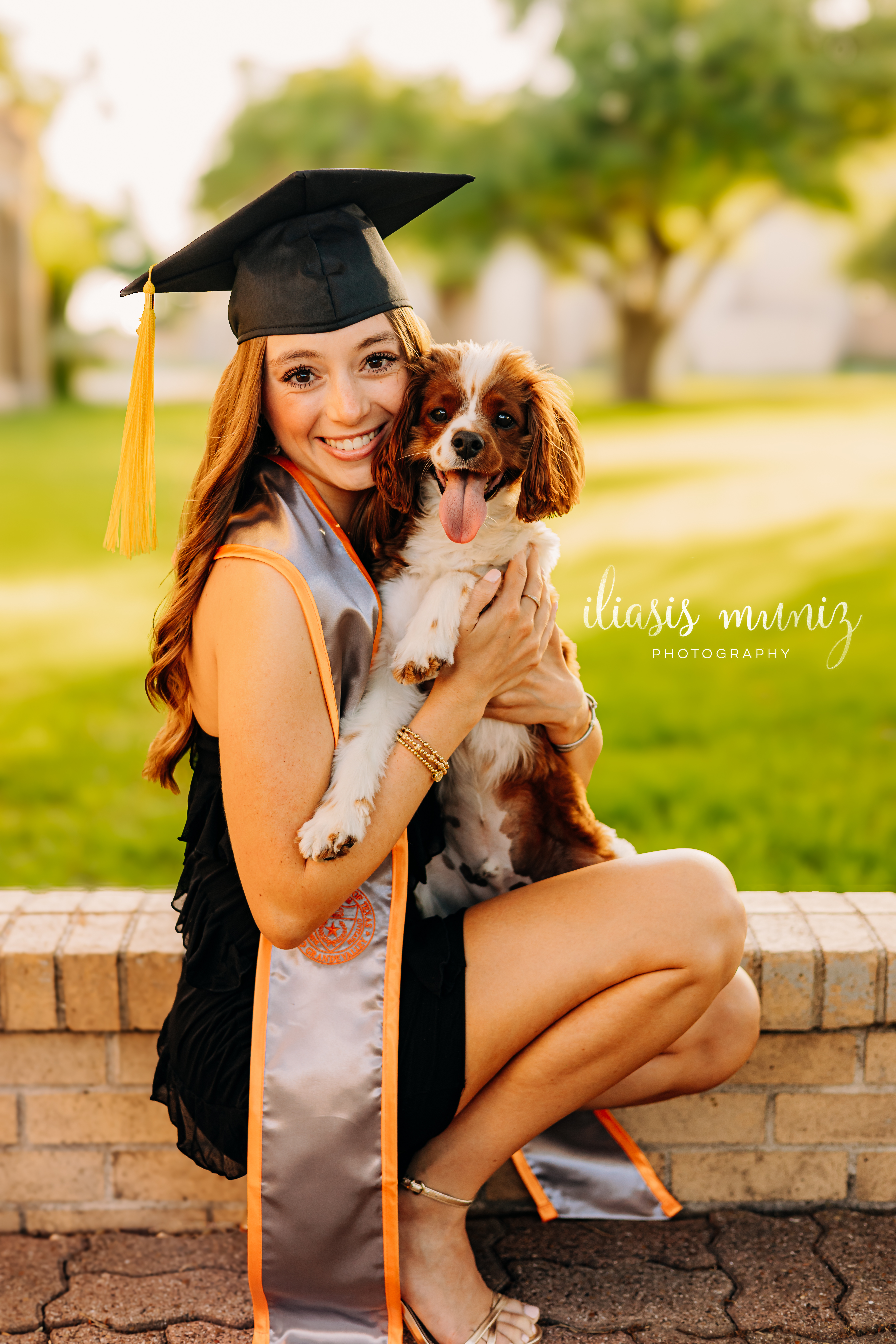 Graduation cap and gown photo at UTRGV main campus 